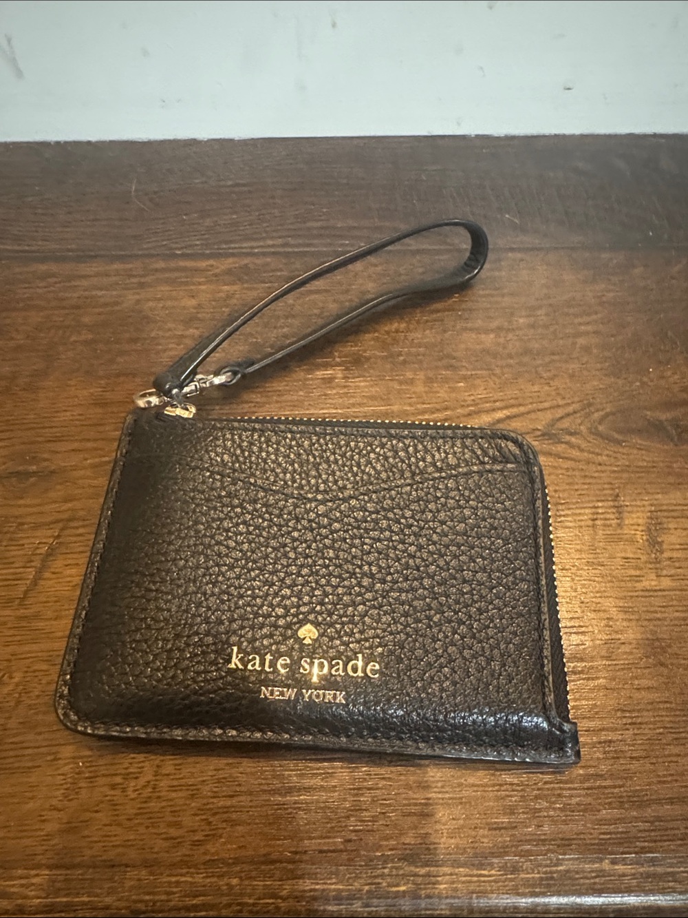 kate spade Black Pebbled Leather Wristlet Card Case with Gold Logo